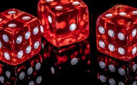 Live dealer blackjack table with multiple players and professional dealer